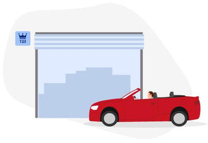 A red car is parked in a secure vehicle storage unit, illustrating Storage King's 'no commitment' philosophy for car owners. Our experienced, customer-first approach means you can start today and enjoy the freedom of a trusted, month-to-month agreement without being locked into a long-term contract.